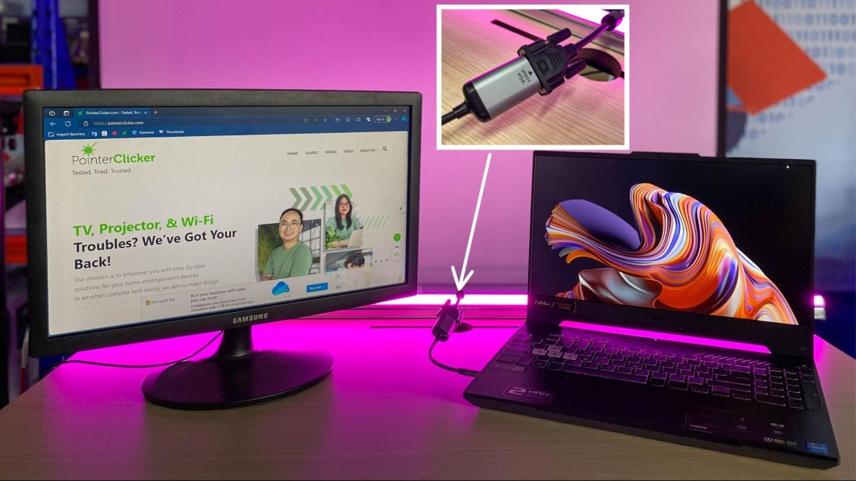 a laptop and monitor is connected with a USB-C to VGA adapter