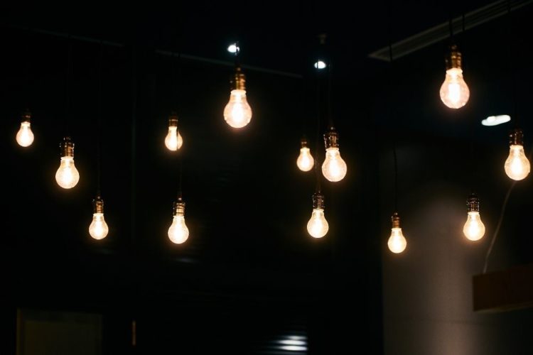 light bulbs hanging in the dark