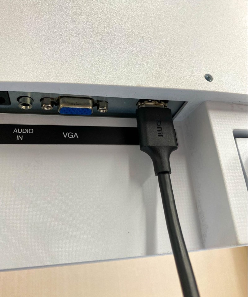 plug an HDMI cable into a monitor