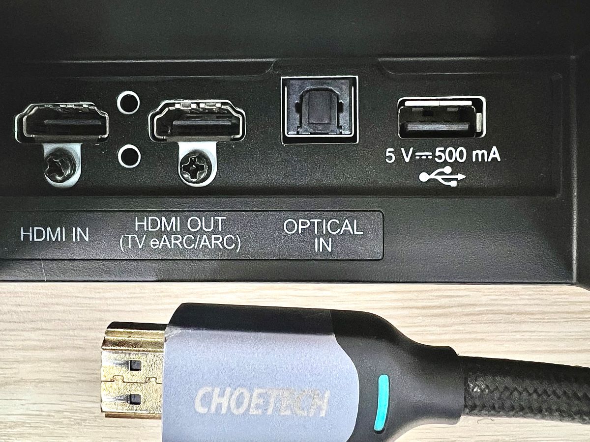 ports of a soundbar and a part of an hdmi cable