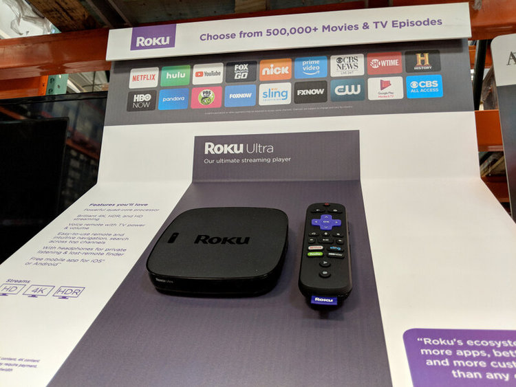 Roku Ultra and its remote control on display