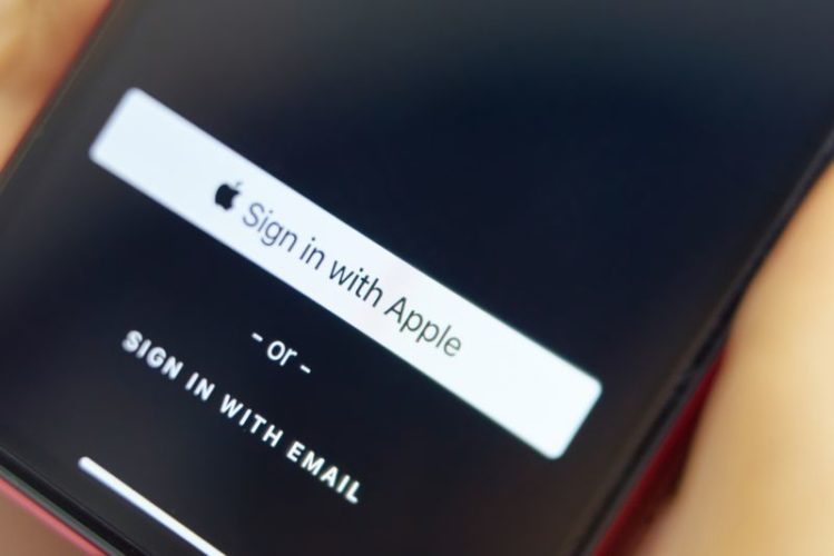 Sign in with Apple button on a smartphone screen