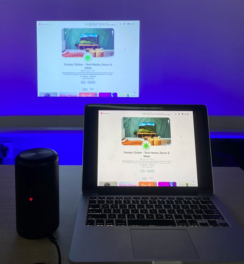 a Macbook is cast on the Nebula projector screen