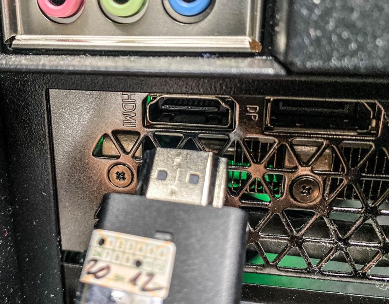 connect an HDMI cable to an HDMI port on the PC case