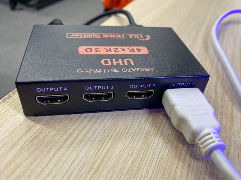 connect an HDMI cable to the HDMI out port on the HDMI splitter