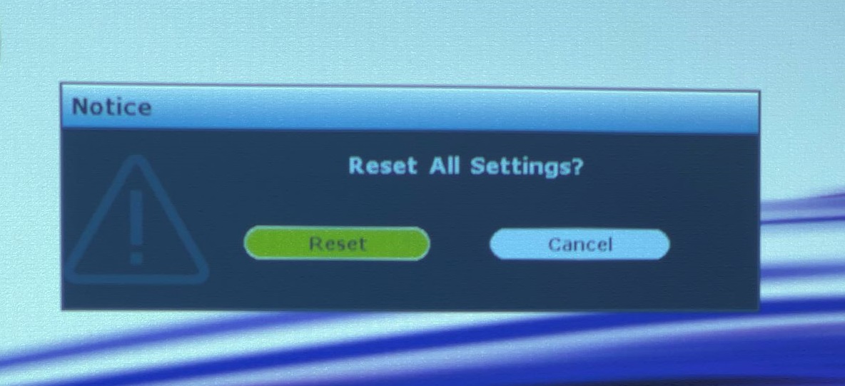 The notice on BenQ projector prompts to if user want to reset the settings or not