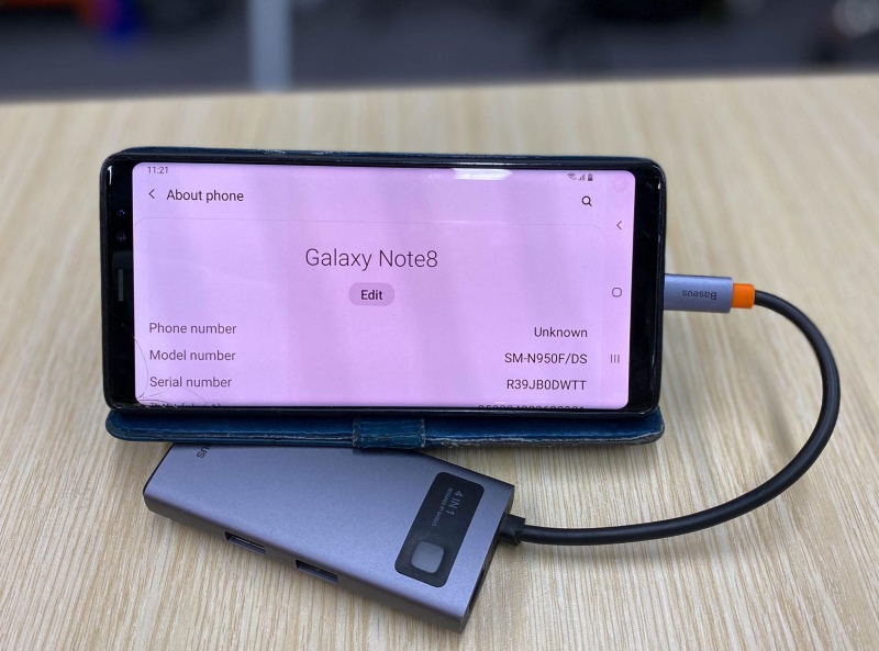 a Galaxy Note 8 is placed on the USB-C to HDMI adapter