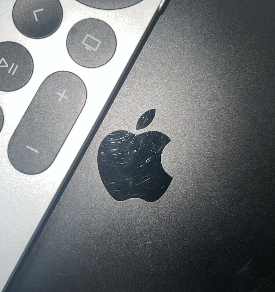 an image of apple tv and apple tv remote