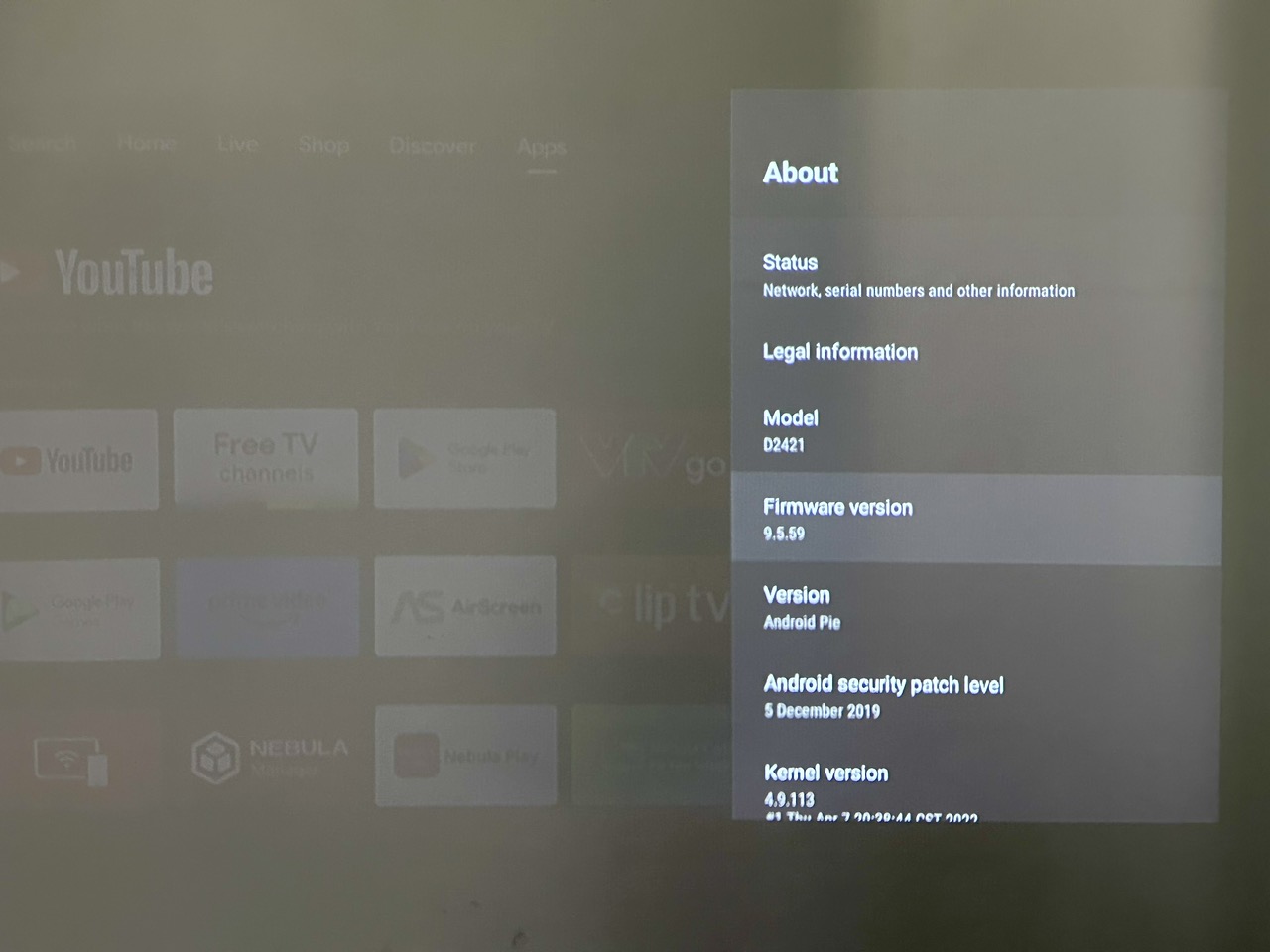 firmware version option is highlighted on the nebula projector