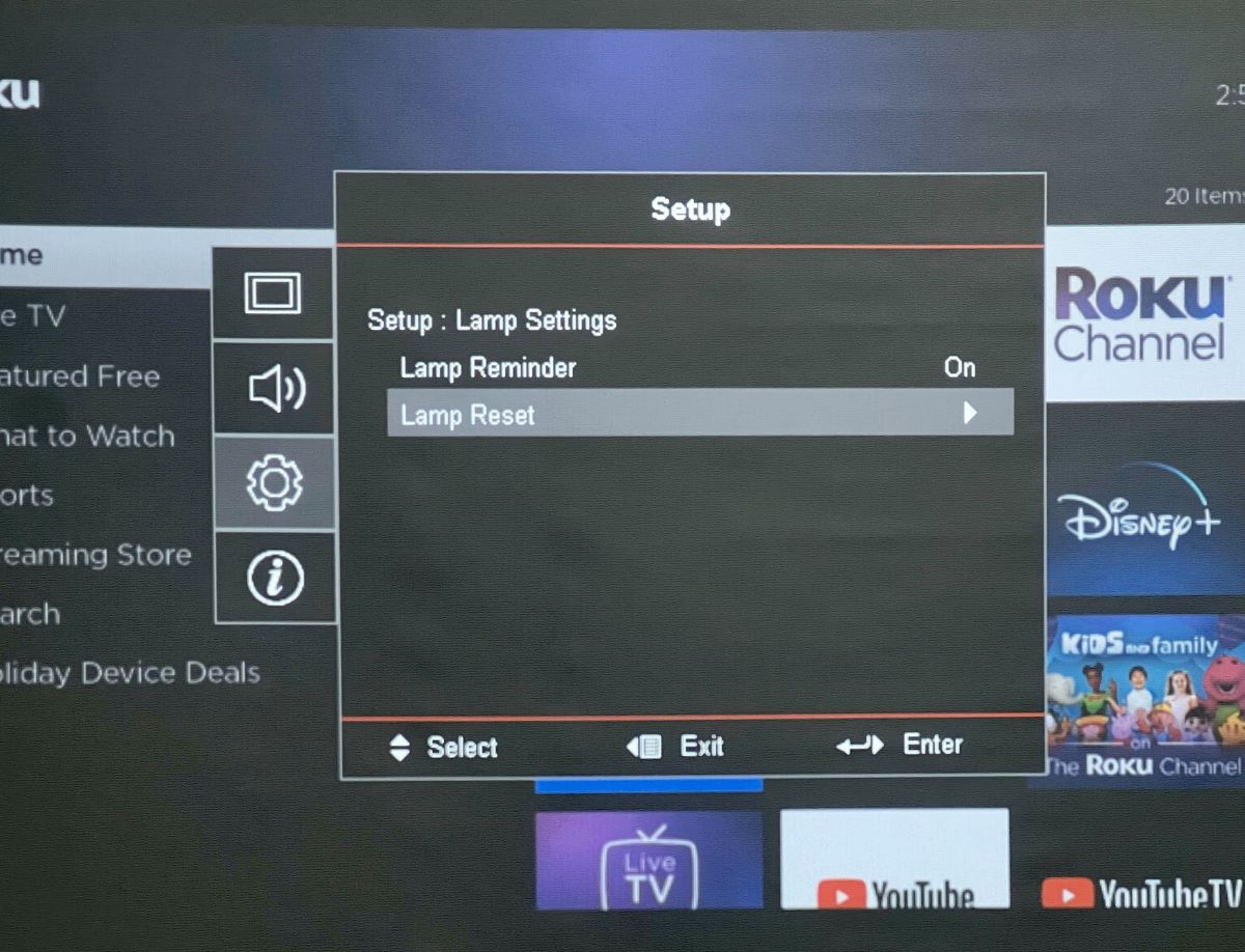 lamp reset option is highlighted on an optoma projector