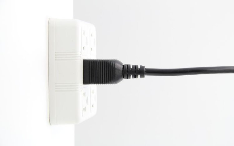 power cord plugged in outlet