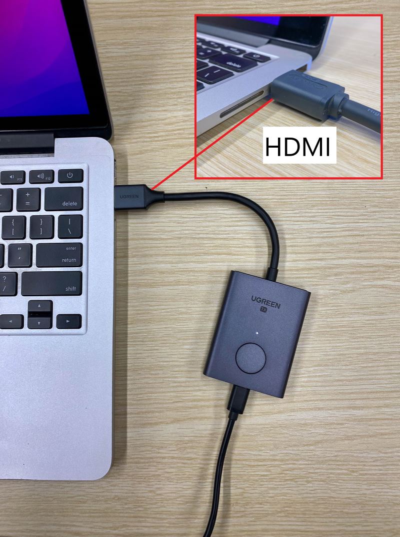 HDMI Wireless Transmitter is connected to Macbook via HDMI port