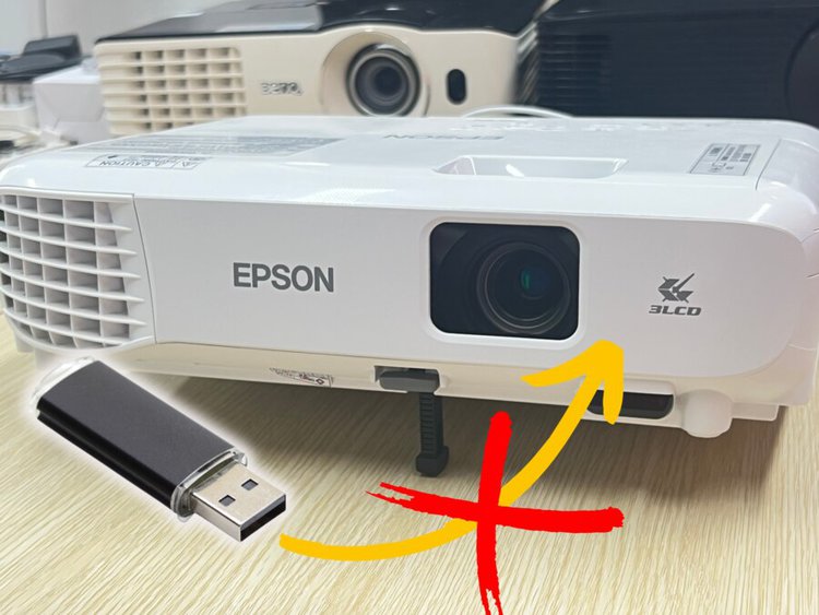 In the image, there is an Epson projector and a USB, there is an arrow pointing from the usb to the projector, and there is an X cross on the arrow, implying the USB can't connect to the projector