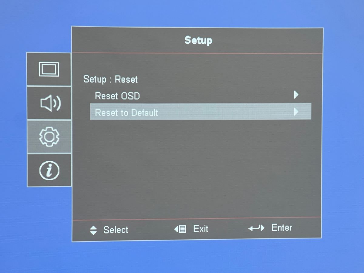 Reset to default is being selected on the Optoma menu projector