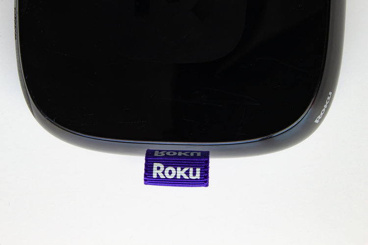 Roku box in black color with tag