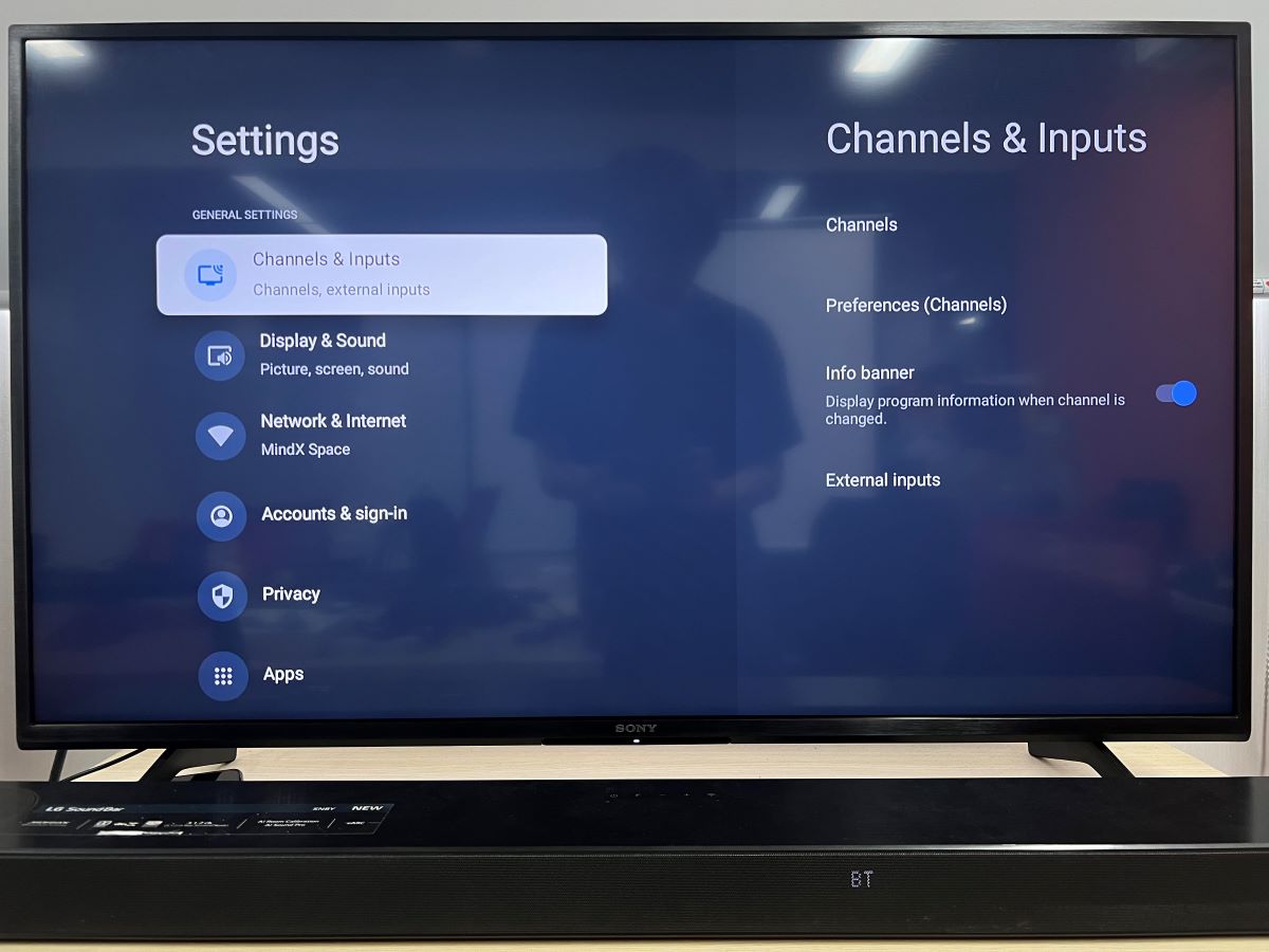 Sony TV with a soundbar and the TV is accessing to the Settings and about to select the Chanel and Inputs option