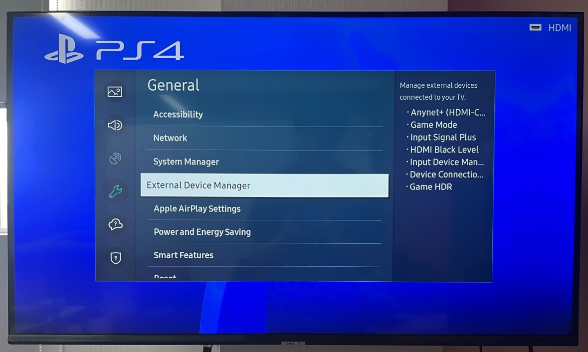 The Samsung TV is selecting external devices option and highlighted with a white box