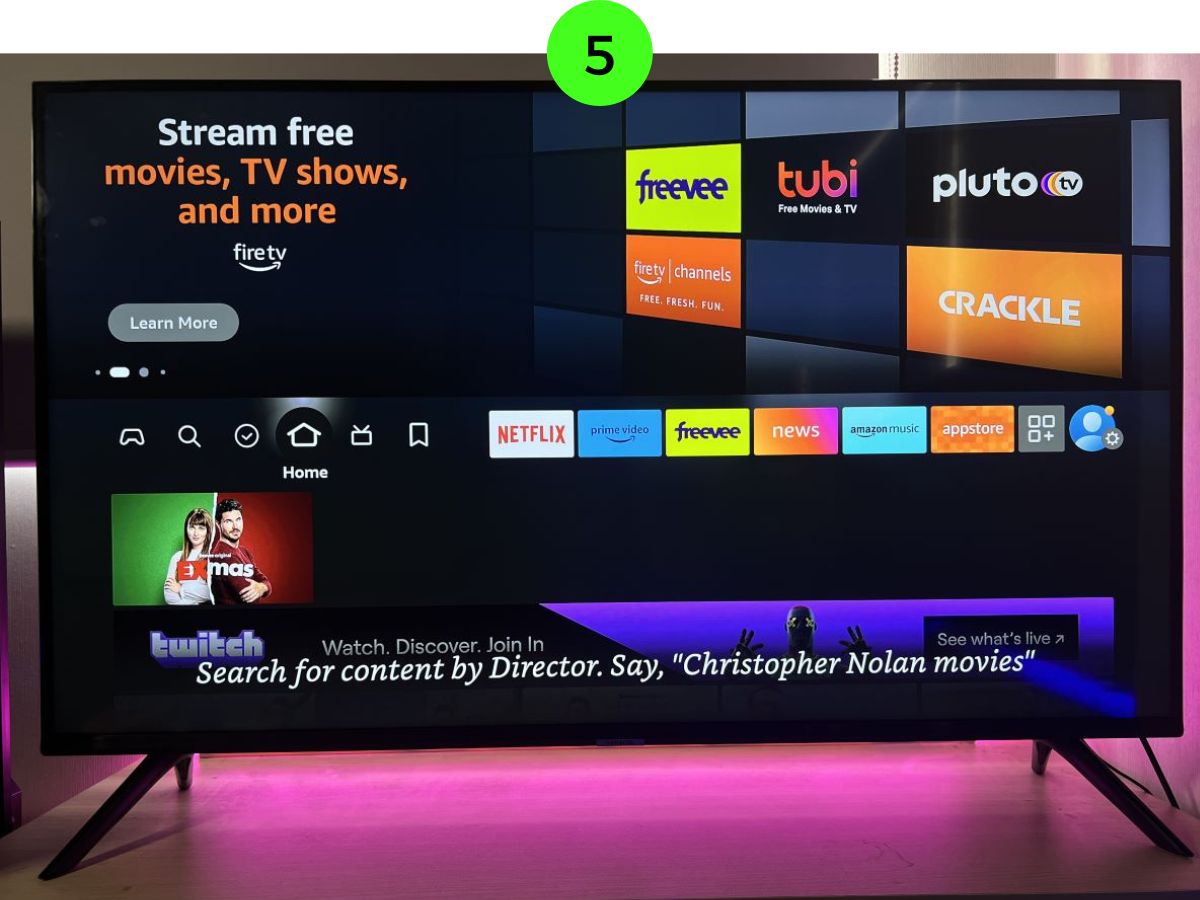 The interface of the Fire TV Stick on Samsugn TV with a pink background