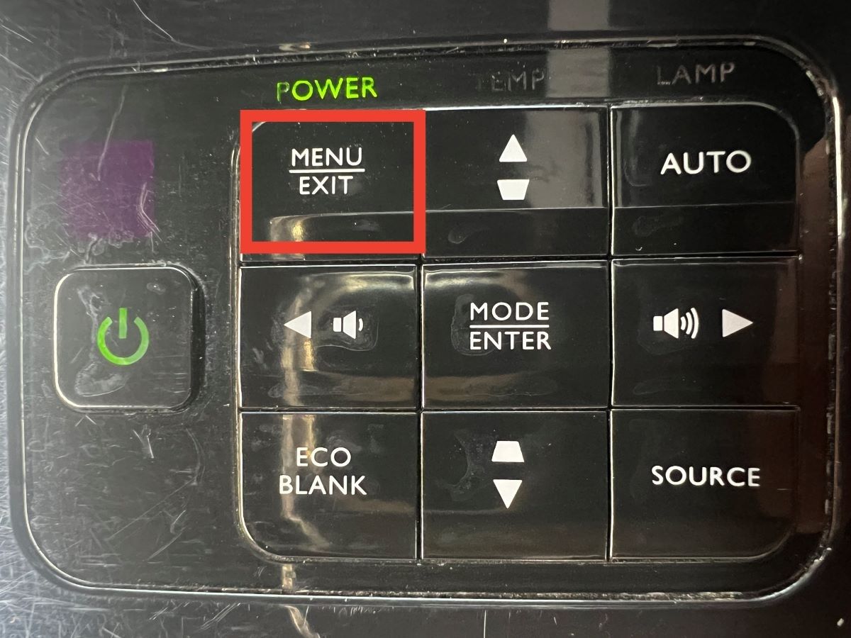 The menu home button from the control panel on BenQ projector