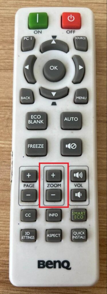 Zoom + and Zoom - buttons on BenQ projector remote