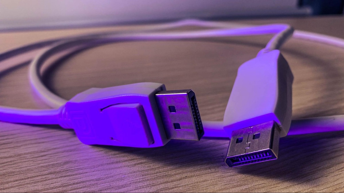 a DisplayPort cable is placed on a table