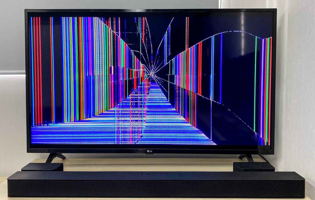 a heavily damaged smart TV screen