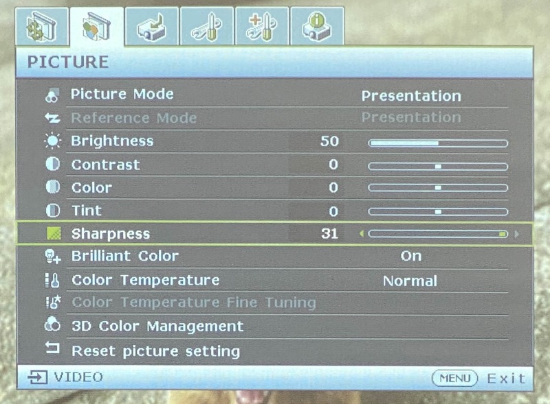 adjust the Sharpness to a maximum value of 31 on the BenQ projector