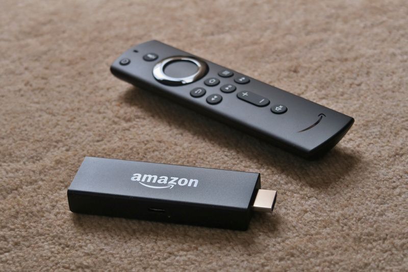 an Amazon Fire Stick and remote