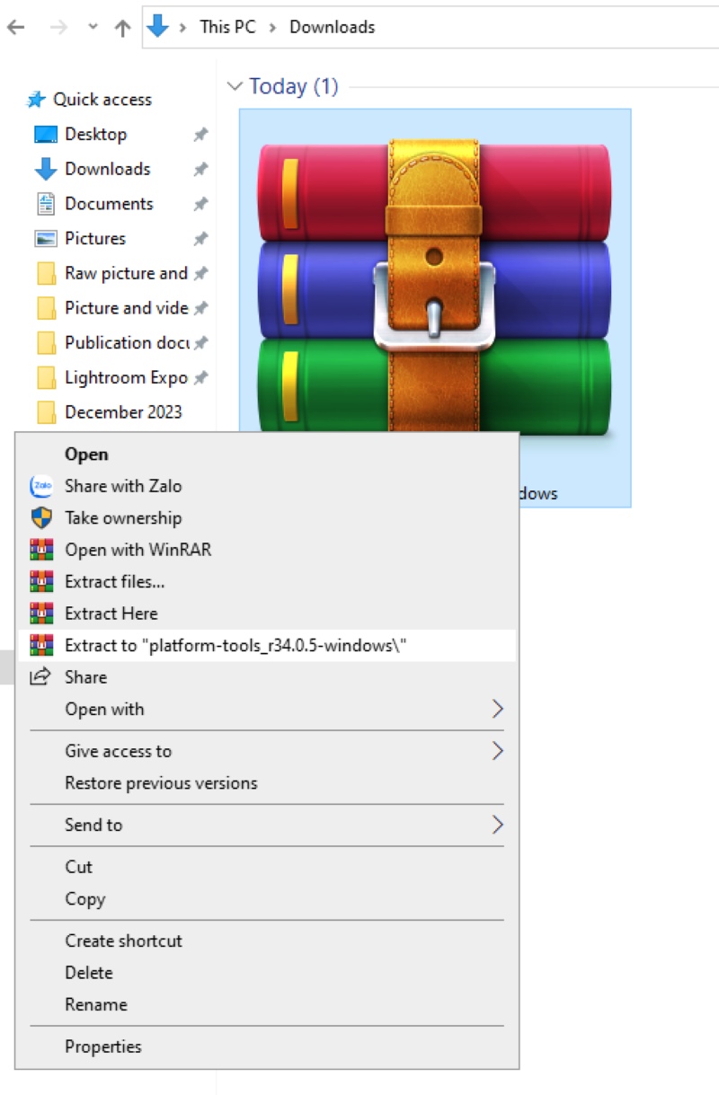 extract a RAR file on the Windows PC Downloads folder