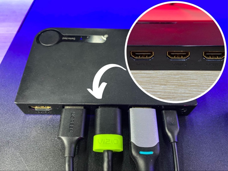 plug HDMI cables into three in HDMI ports of the HDMI switch