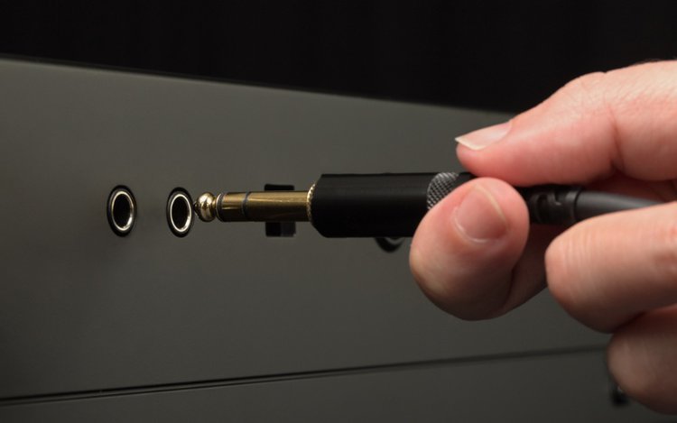 plug a cable into headphone jack of a tv