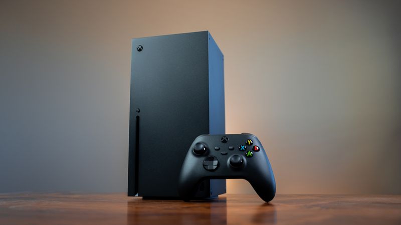 the Xbox Series X on wooden surface