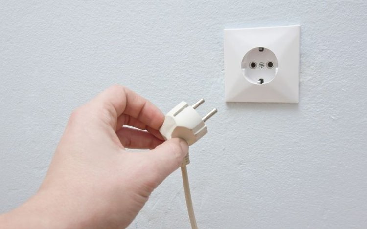 unplugging white cable