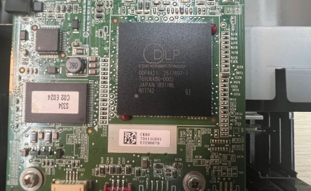 The DLP chip inside of the Optoma projector
