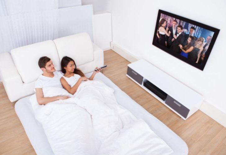 Pros & Cons of Having a TV in a Bedroom