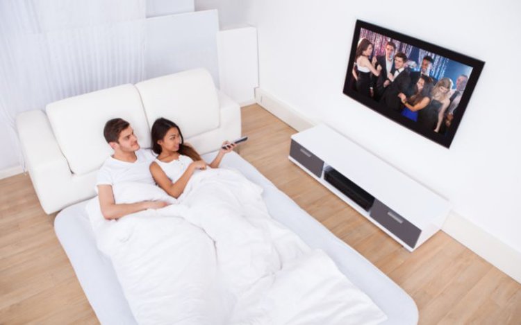 Pros & Cons of Having a TV in a Bedroom