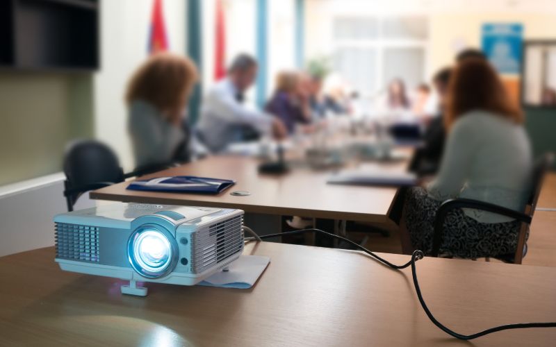 a working projector in a meeting room