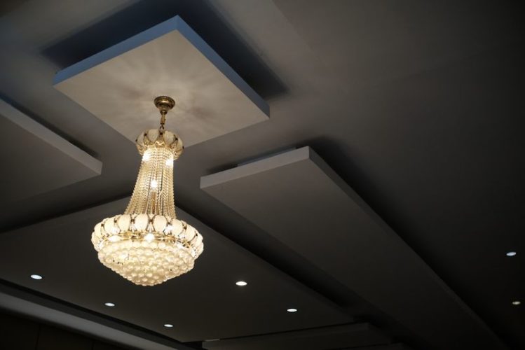 black ceiling with yellow ceiling lights
