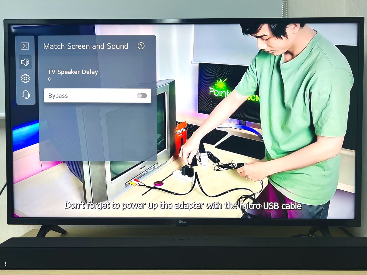 lg tv showing a tutorial video while adjusting the match screen and sound feature