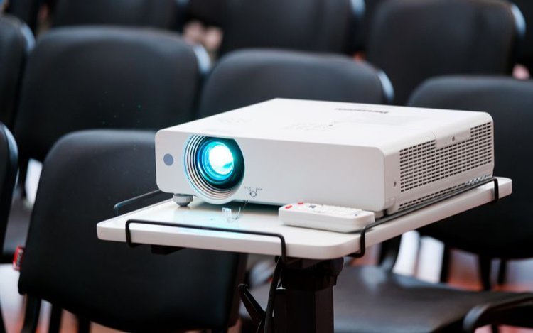 white projector on the stand