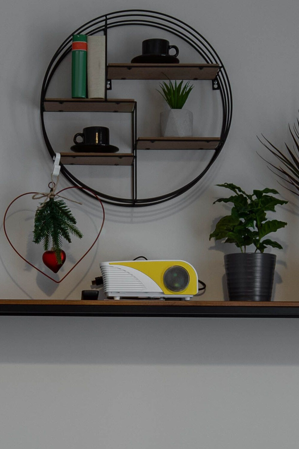 Projector on a shelf