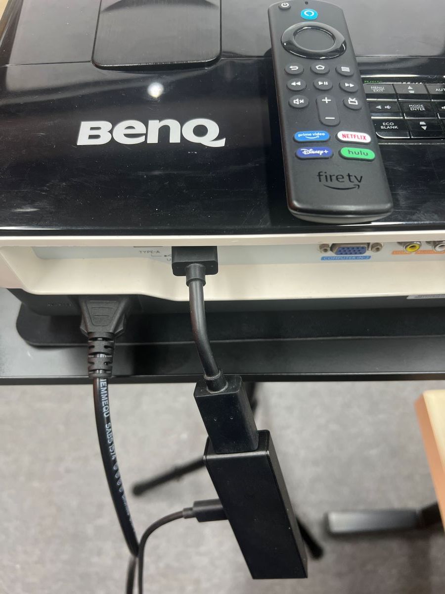 The Fire stick remote and the Fire stick is connected to BenQ projector