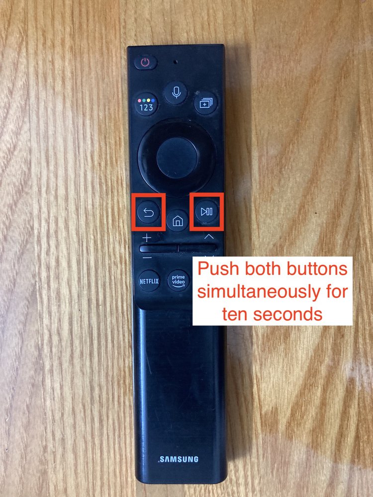 a Samsung remote with back and pause buttons