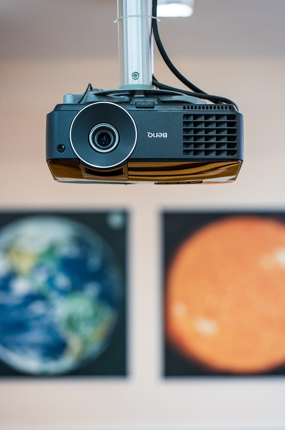 a projector mounted onto the ceiling