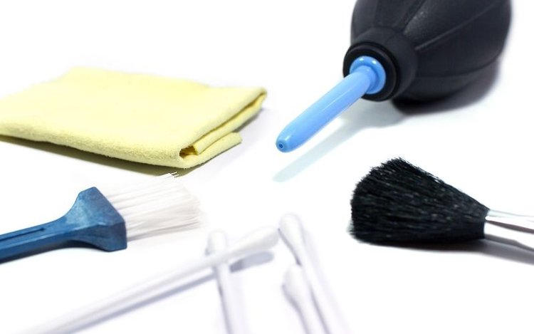cleaning kit with air blower, brushes, cotton swabs and microfiber cloth