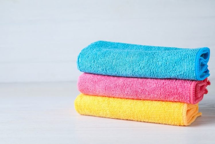 colorful microfiber cloths in white background