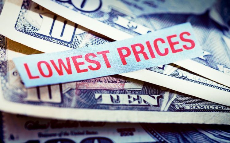 lowest prices note on bunch of US dollars