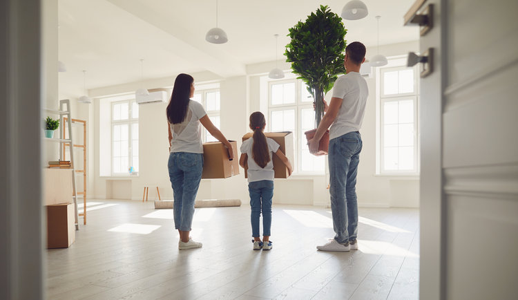 A family moving into an apartment