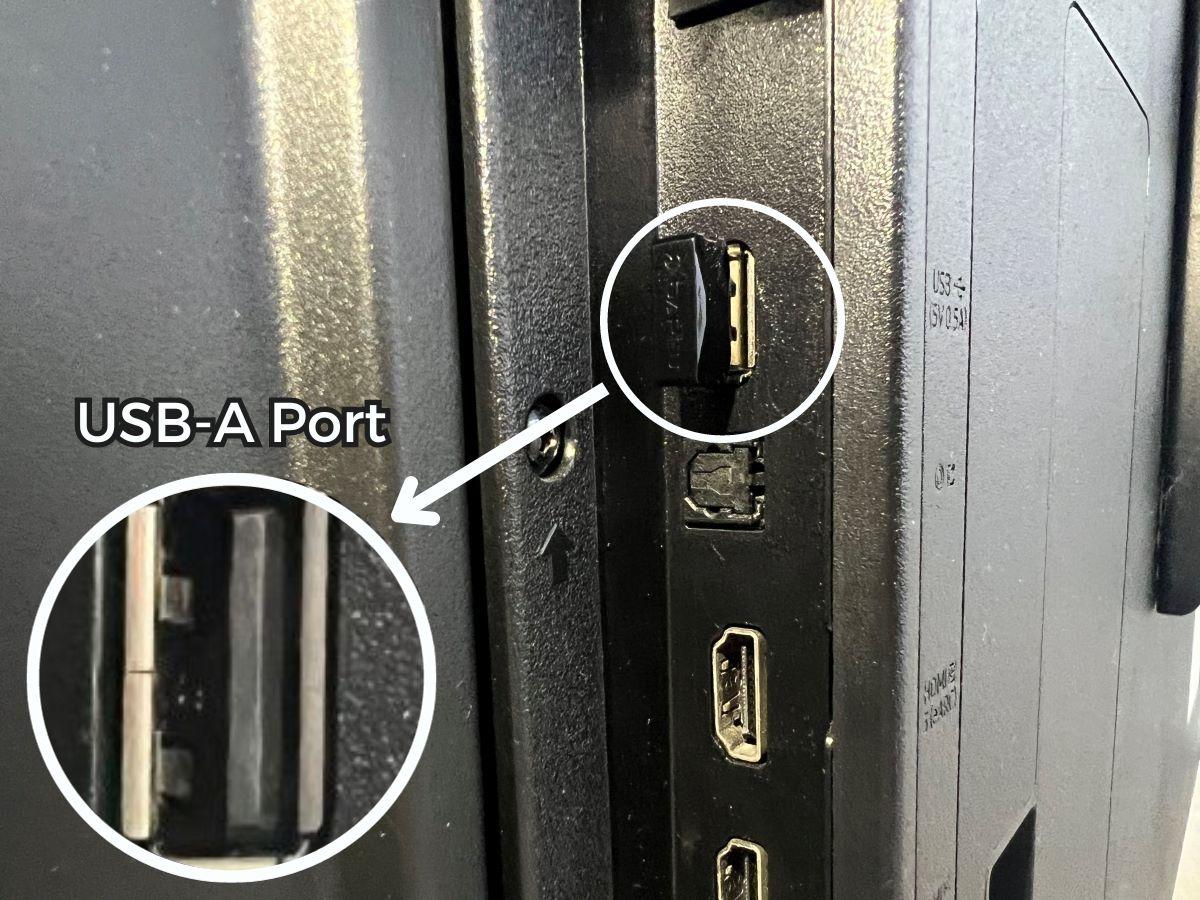The USB RF receiver is plugged into the USB port locates at the back of the TV