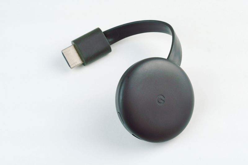 a black Google Chromecast